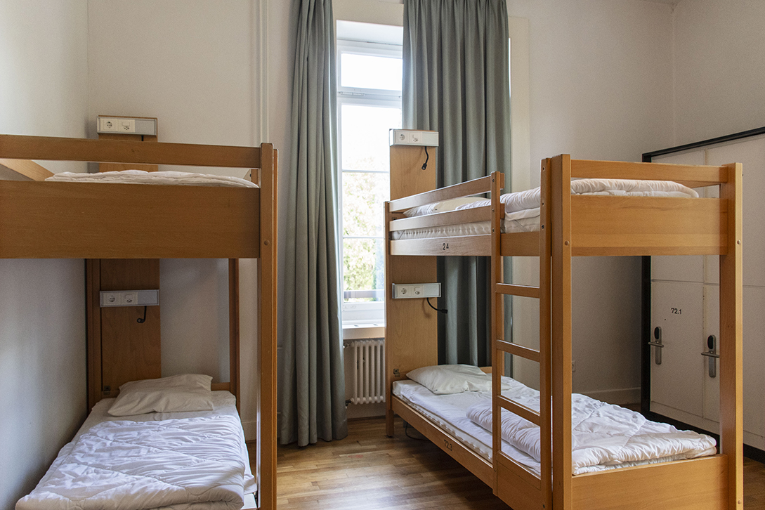 8-bed dormitories with shared bathroom